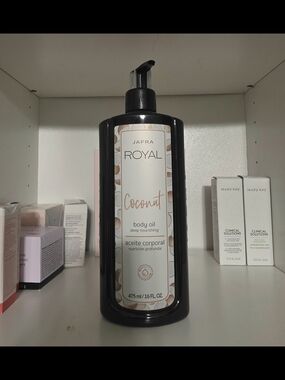 JAFRA Royal Coconut Body Oil - Black Bottle with Cream Label